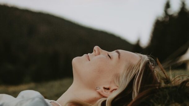 a person lying in the grass